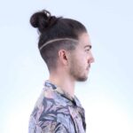 Bun man hair long beard undercut low fade taper hairstyles hairstyle styles men mens top knot menshairstyletips style ideas haircuts